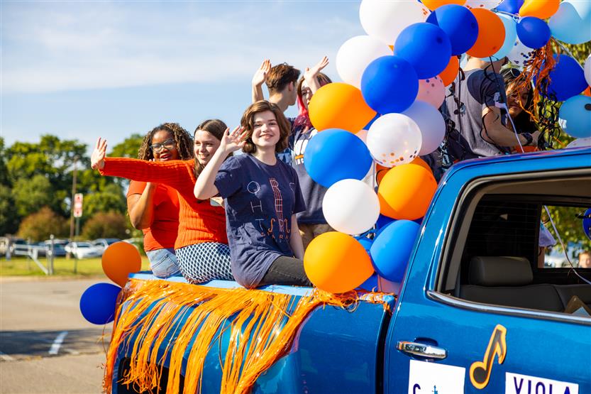 Students at the Summit High homecoming parade